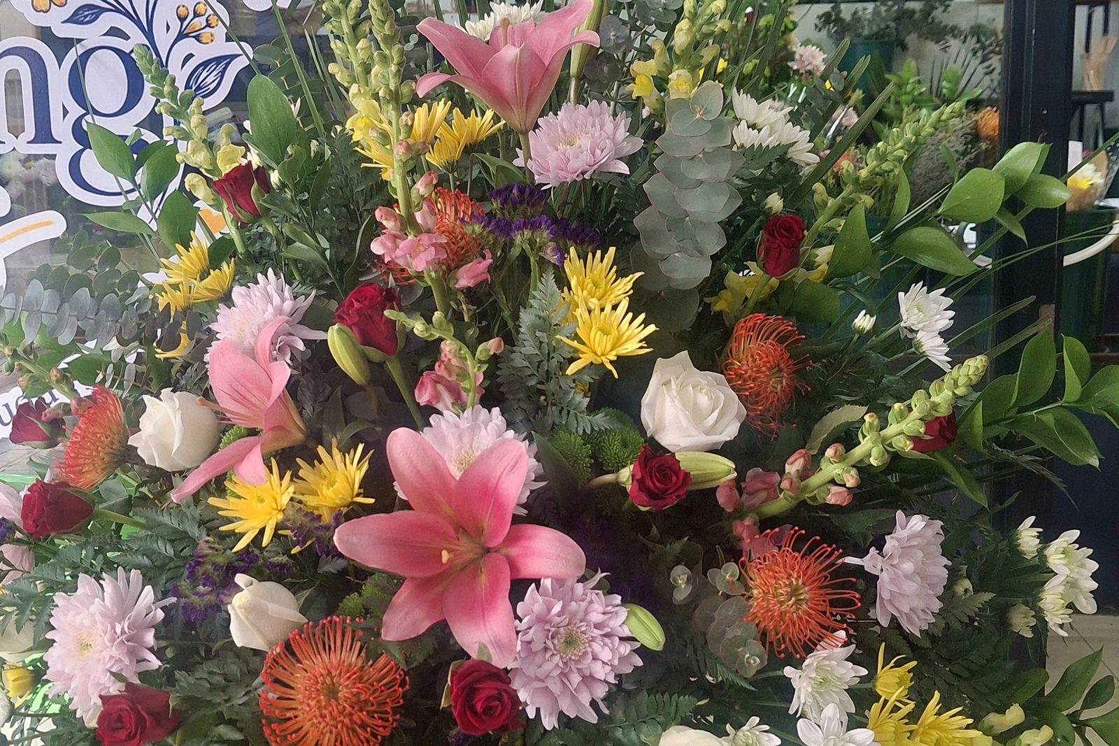 Hand-tied bouquet ready for flower delivery in Strand