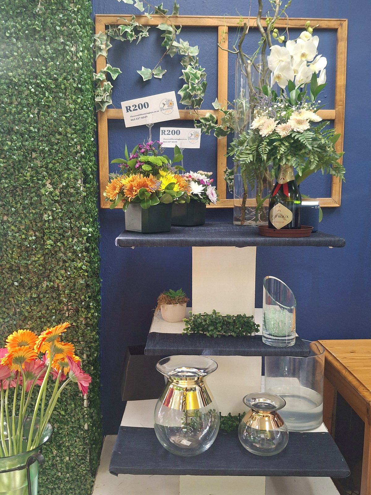 Corporate flower arrangements styled for a Helderberg office reception