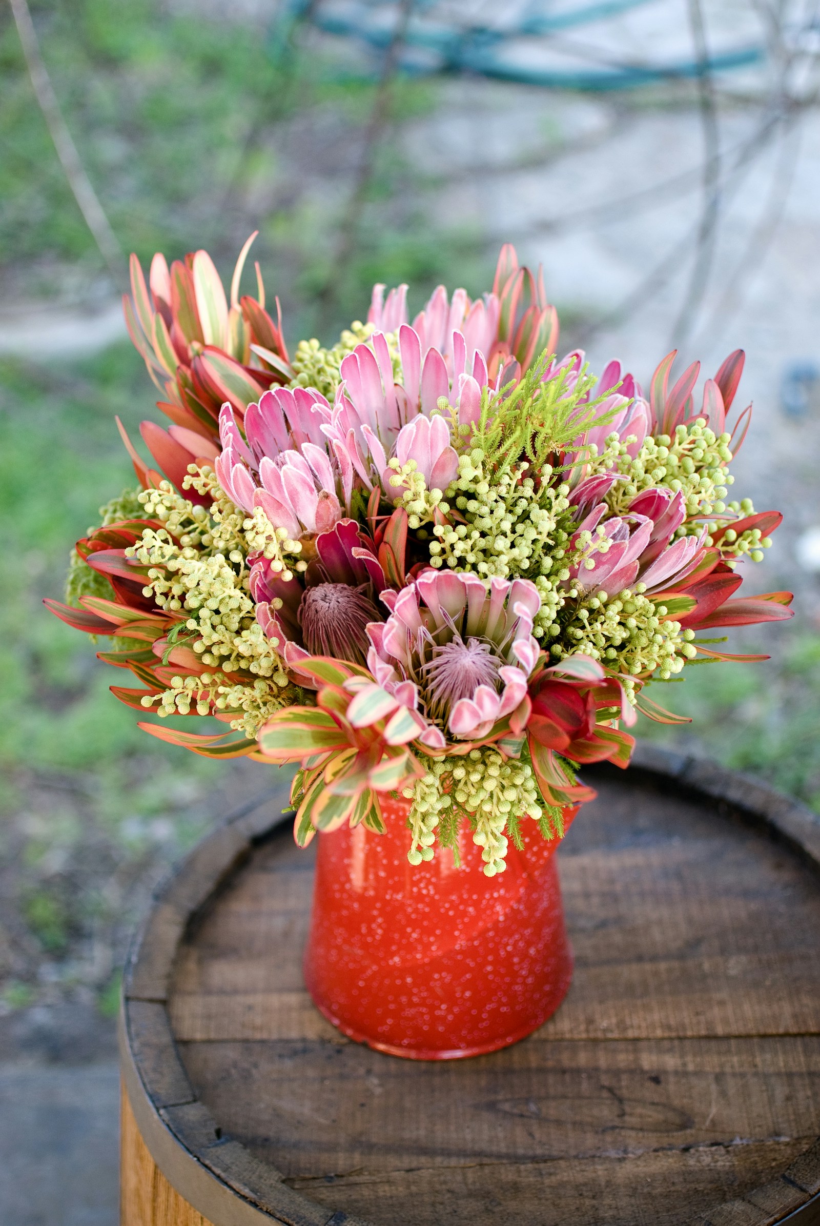 Seasonal protea arrangement from our Helderberg florist studio